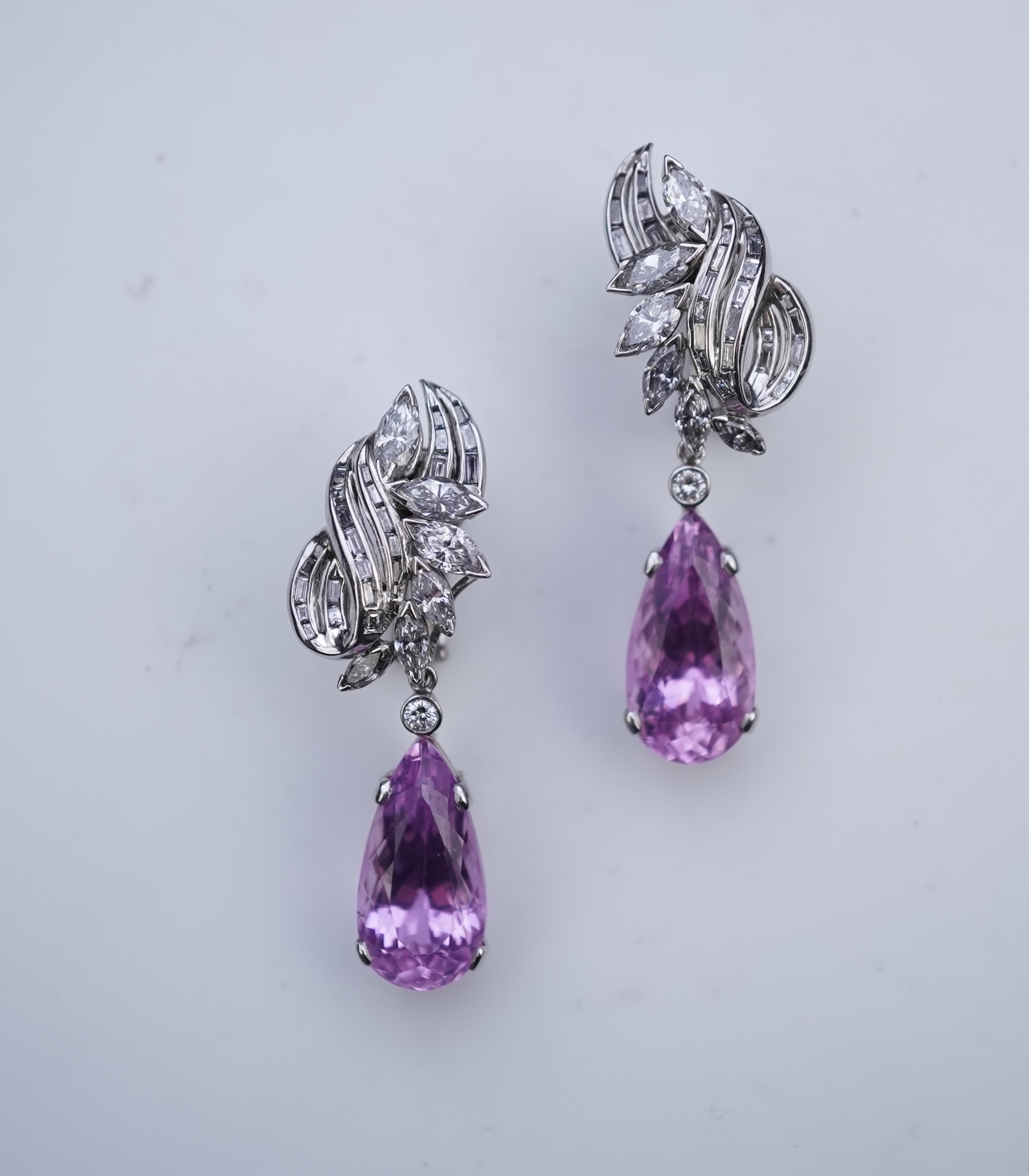 An attractive pair of 'day and night' kunzite and diamond ear clips
